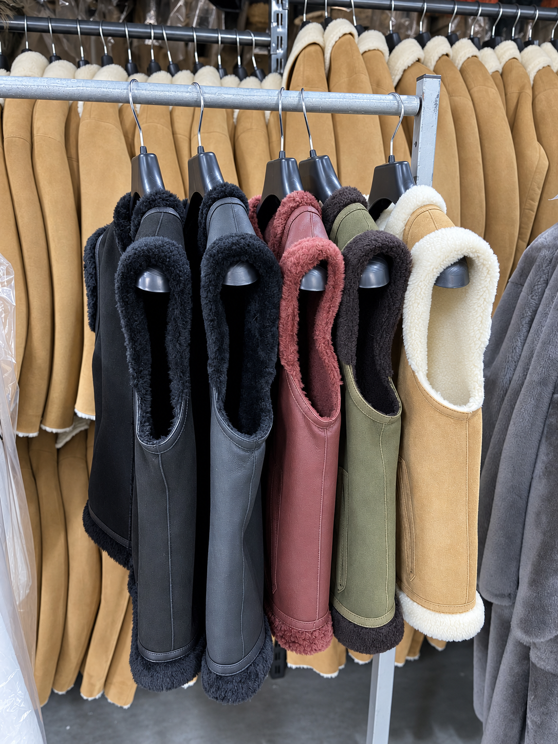 Gilas shearling gilets hanging in the workshop