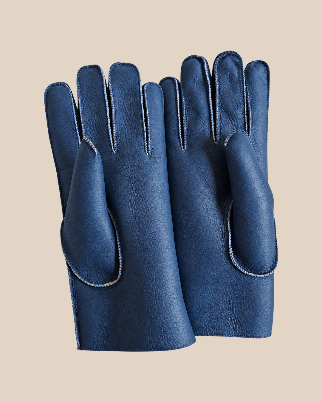 Nappa shearling gloves - blue — product view 02, shearling gloves on a beige background