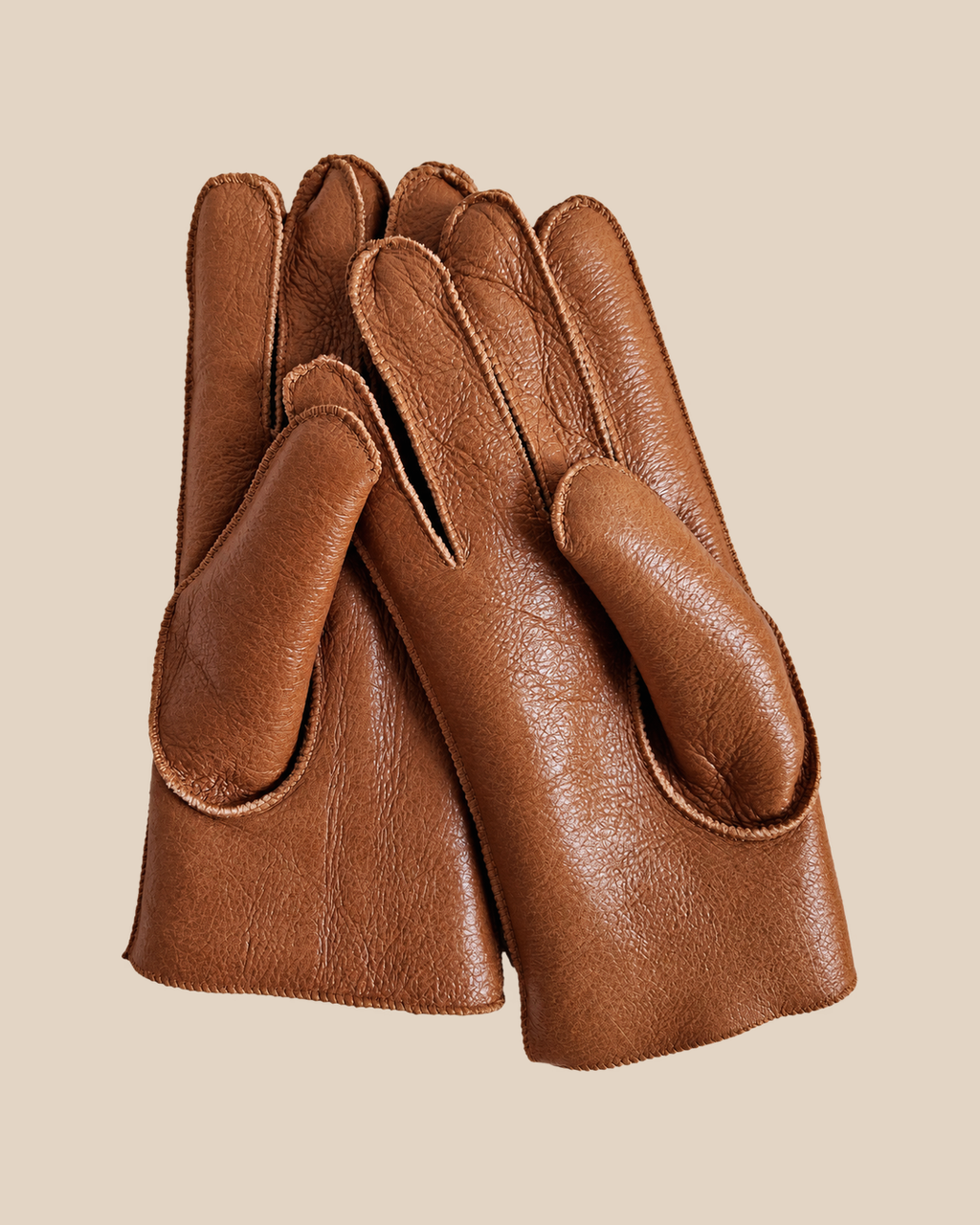 Nappa shearling gloves - brandy — product view 02, shearling gloves on a beige background