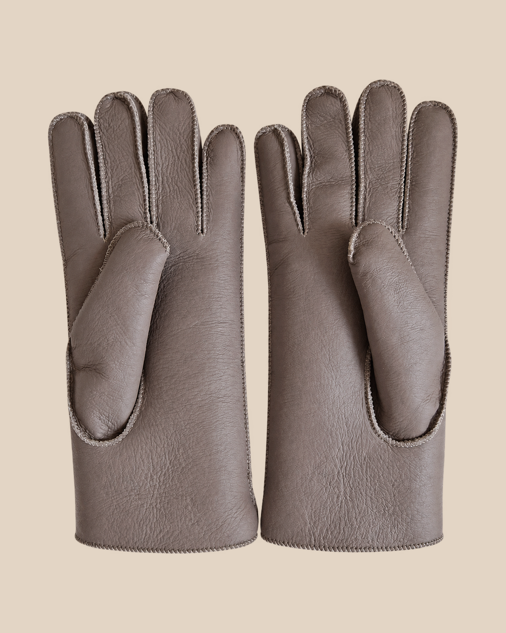 Nappa shearling gloves - snow grey — product view 02, shearling gloves on a beige background