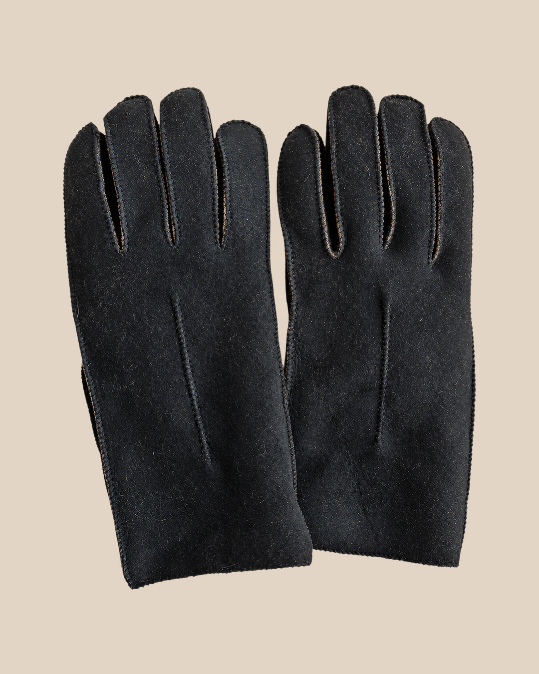 Suede shearling gloves - black — product view 01, shearling gloves on a beige background