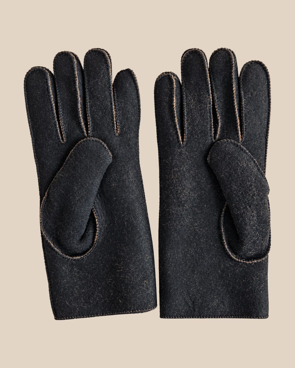 Suede shearling gloves - black — product view 02, shearling gloves on a beige background