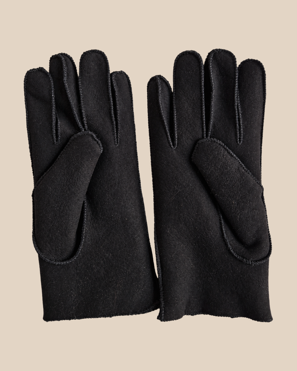 Suede shearling gloves - black — product view 04, shearling gloves on a beige background