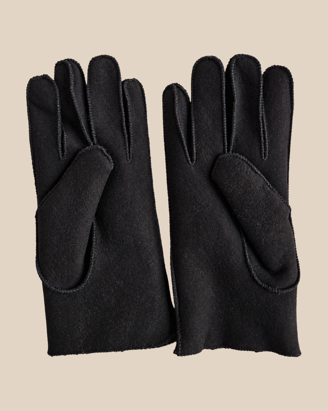 Suede shearling gloves - black — product view 04, shearling gloves on a beige background