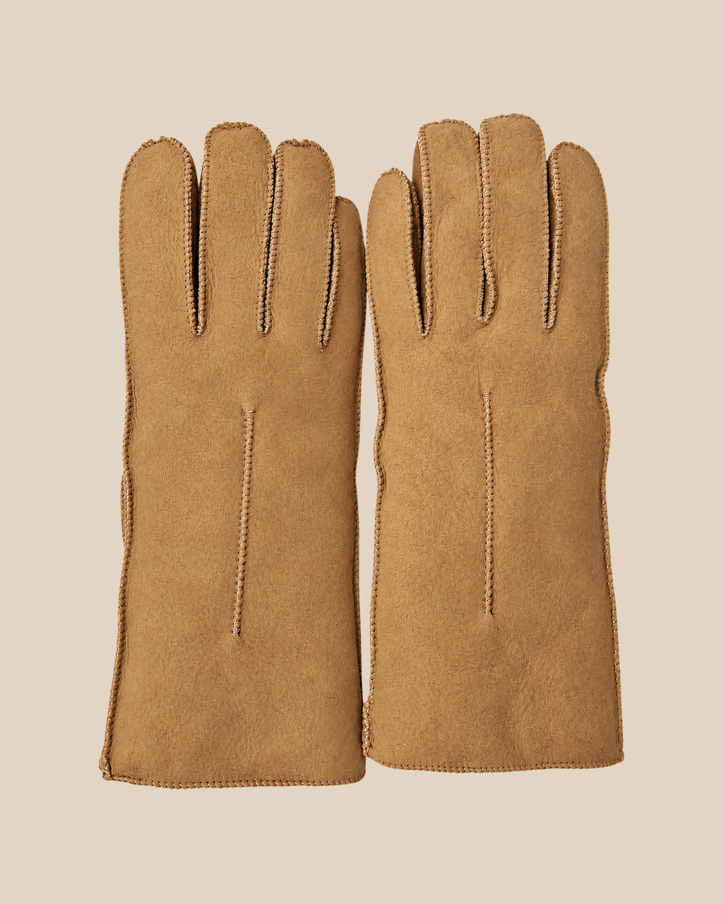 Suede shearling gloves - nude, back view on a beige background