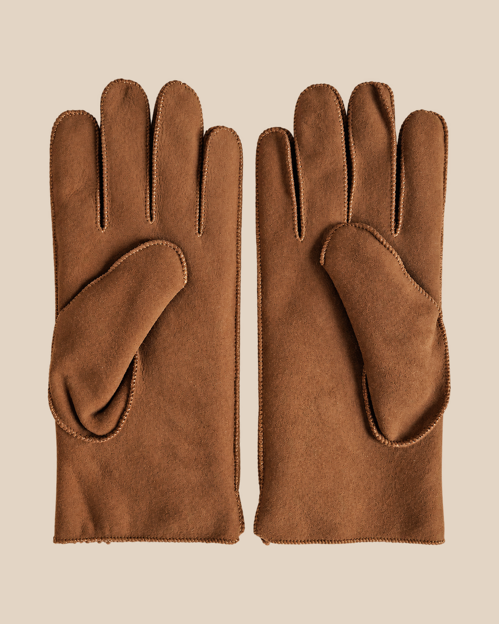 Suede shearling gloves - tobacco — product view 02, shearling gloves on a beige background