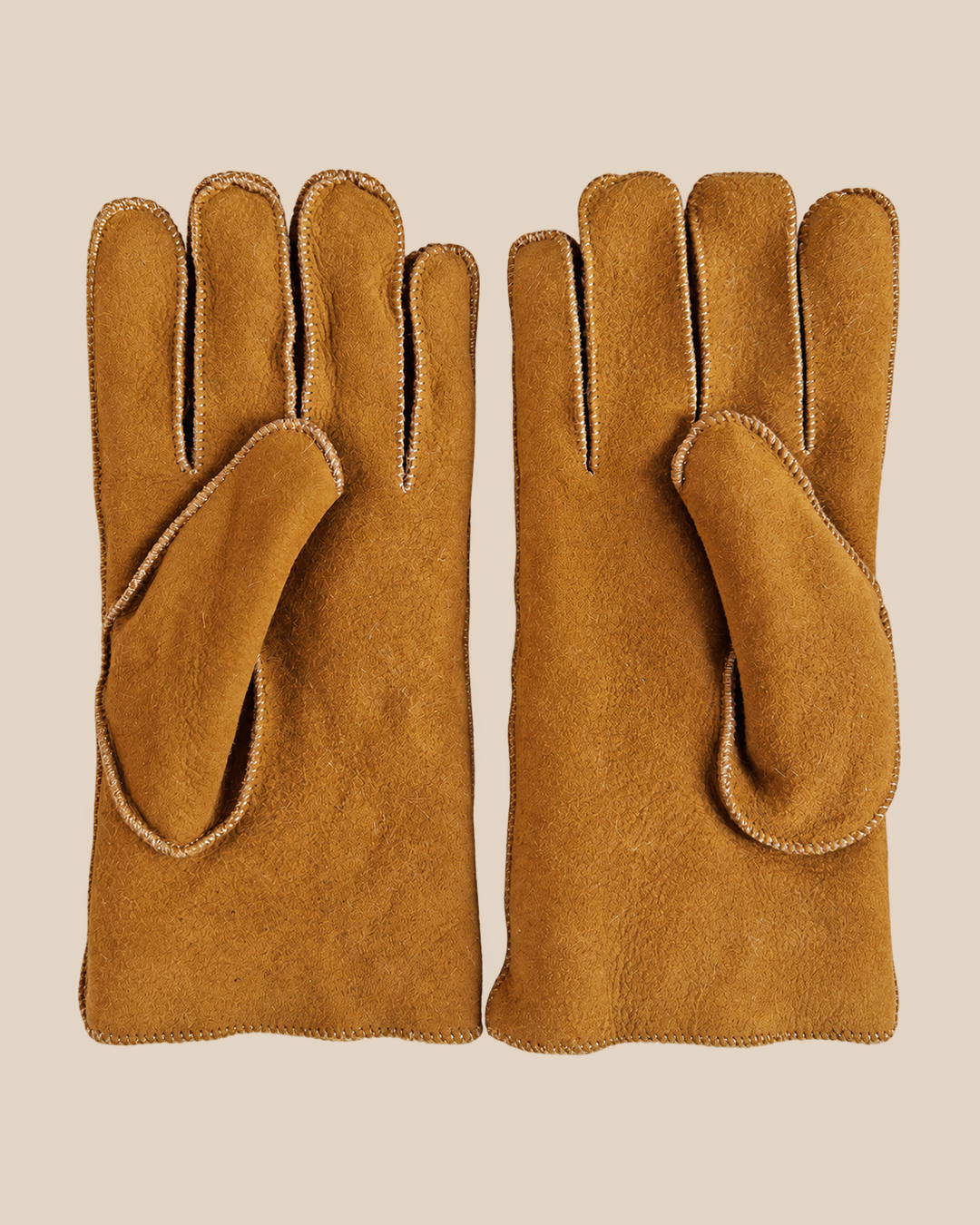 Suede shearling gloves - whiskey — product view 03, shearling gloves on a beige background