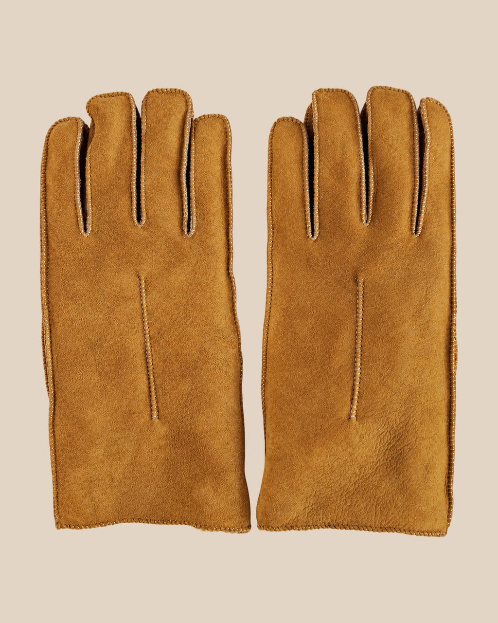 Suede shearling gloves - whiskey — product view 04, shearling gloves on a beige background