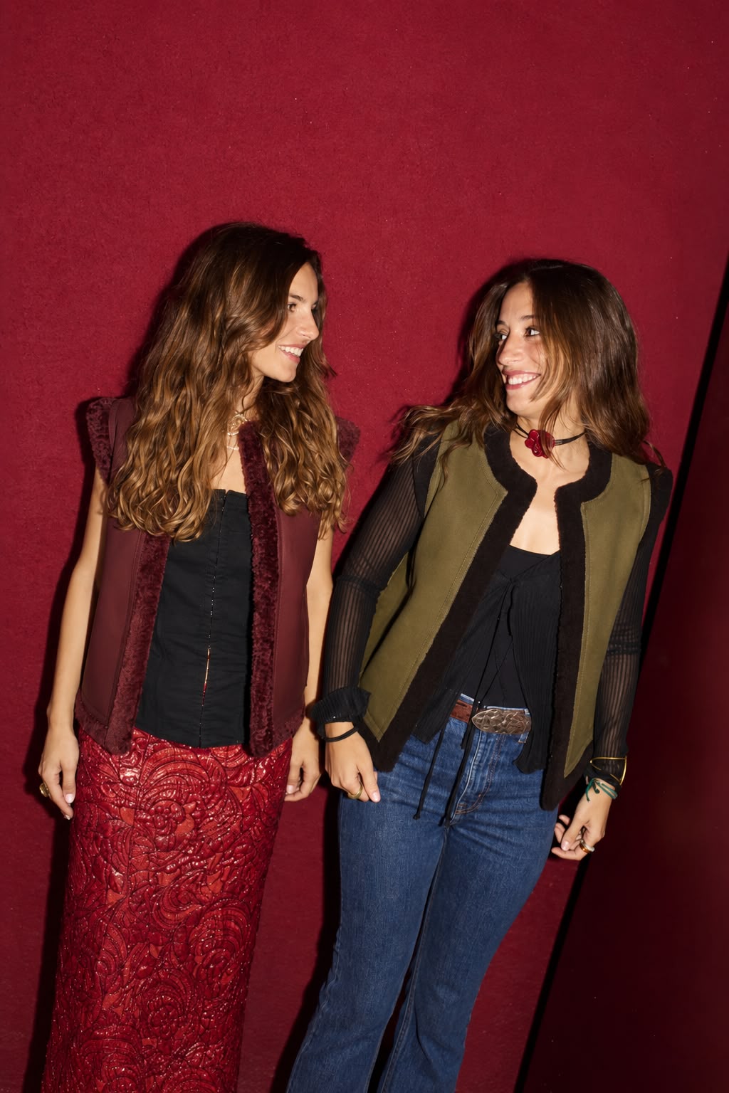 Two women wearing Gilas gilets at a brand event